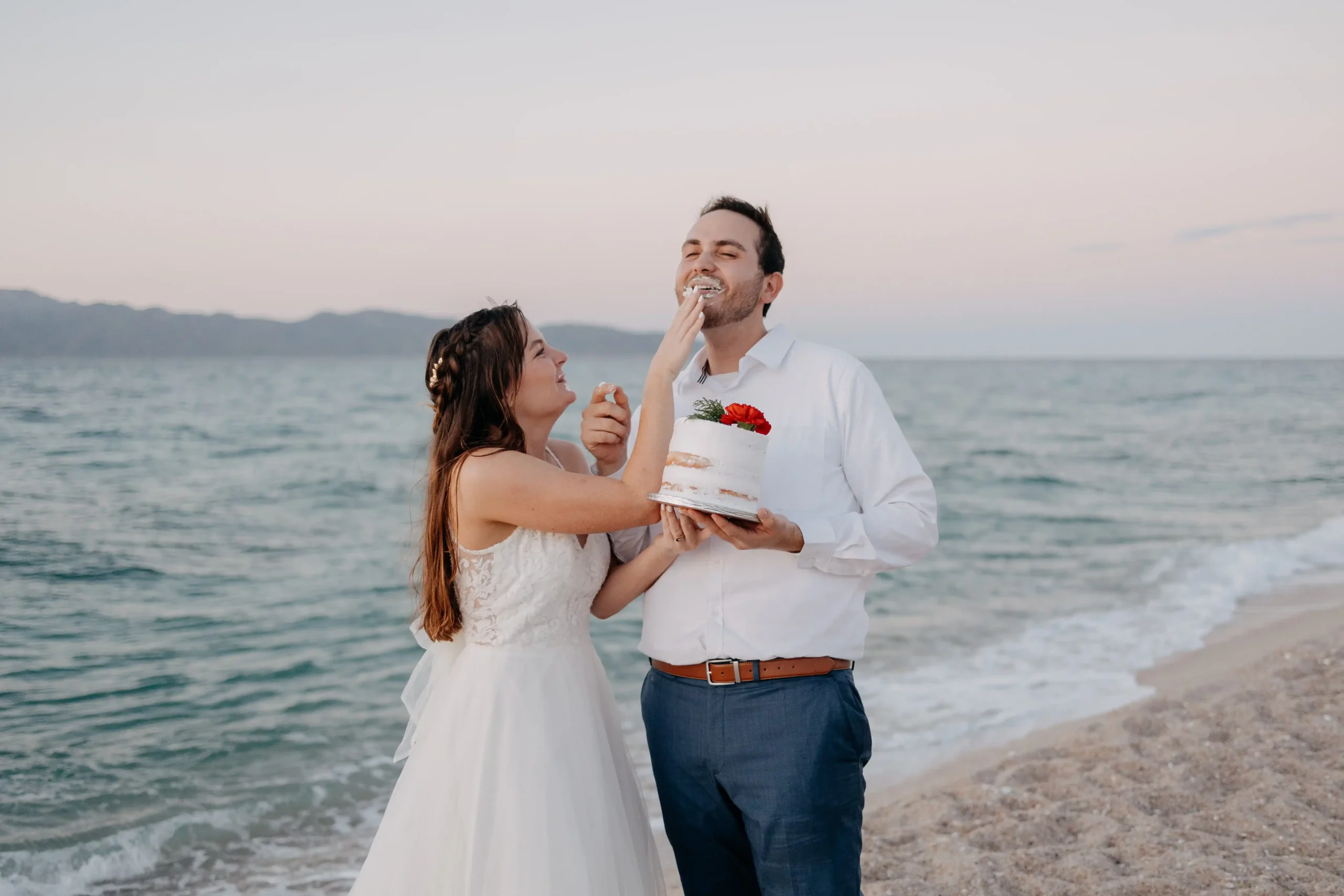 Couple enjoying unique Mexico elopement ideas at sunset