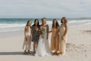 bride and her friends at the beach