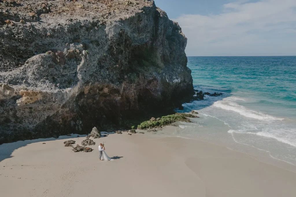 drone photo of a couple hugging after their elopement ceremony. 