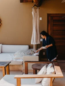 bride getting her dress and accessories together for her elopement in Cala de Mar Resort in Ixtapa. 